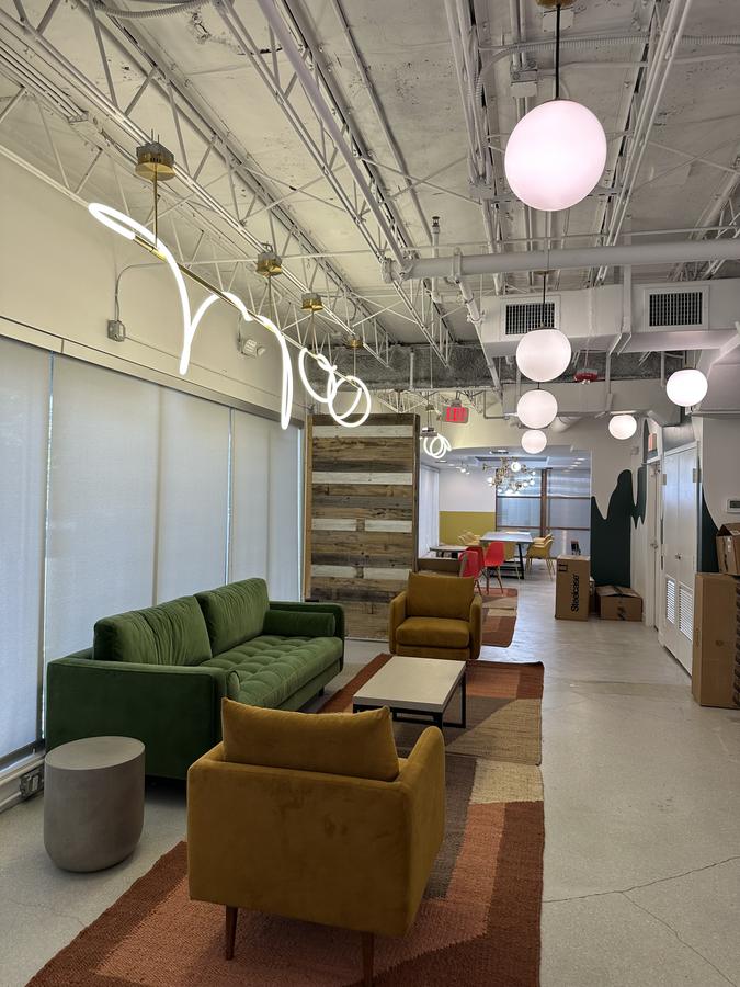 Office lounge with globe pendant lighting